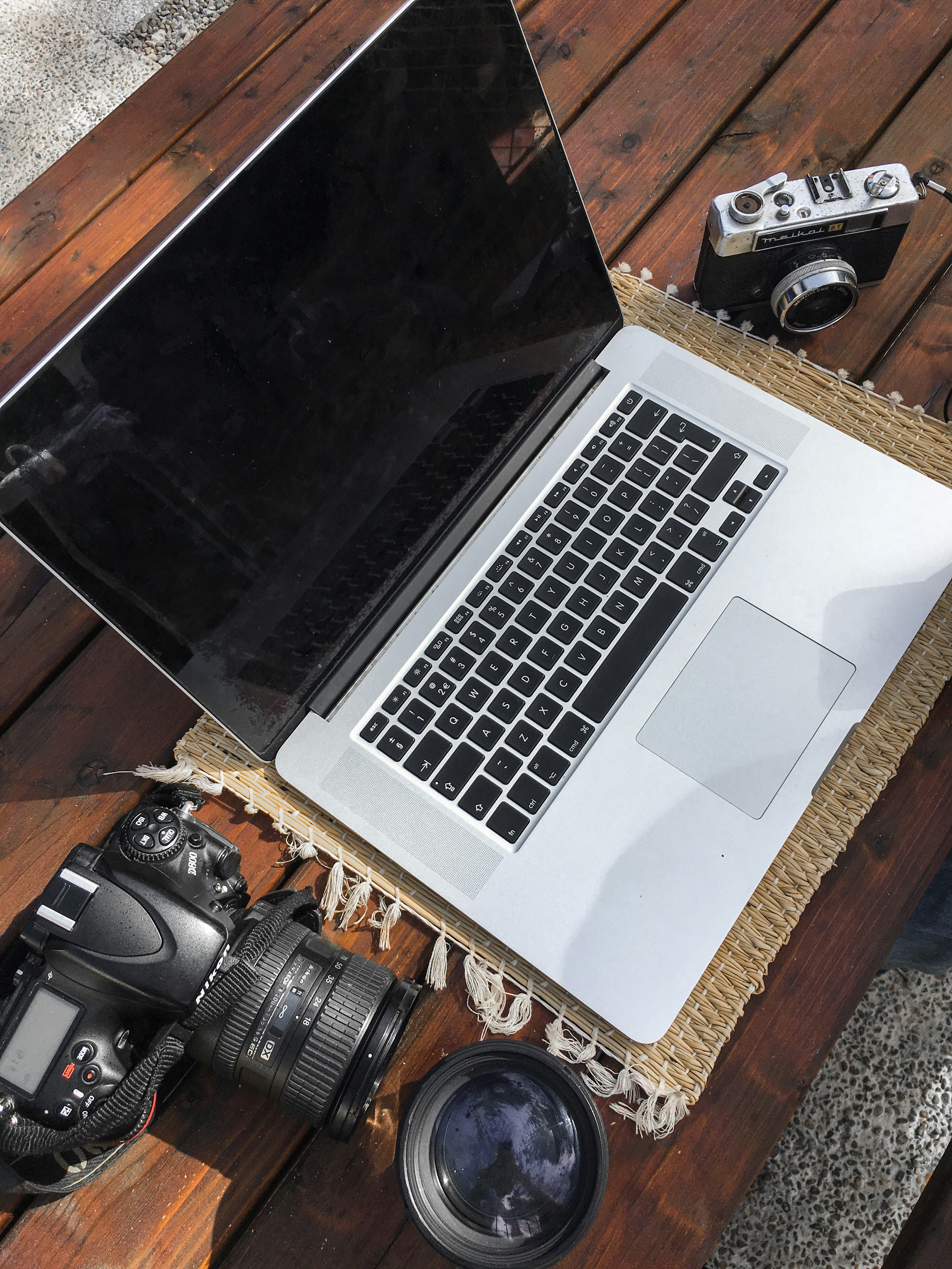 gray laptop computer turned off